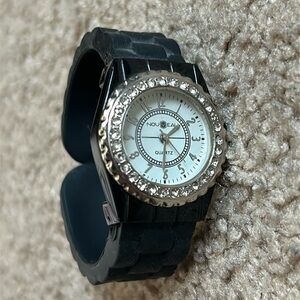 Nouveau women’s vintage black/silver crystal‎ rubber bracelet bangle watch